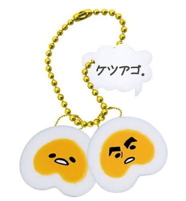 GUDETAMA STRANGE POSE TWO FACES KEYCHAIN