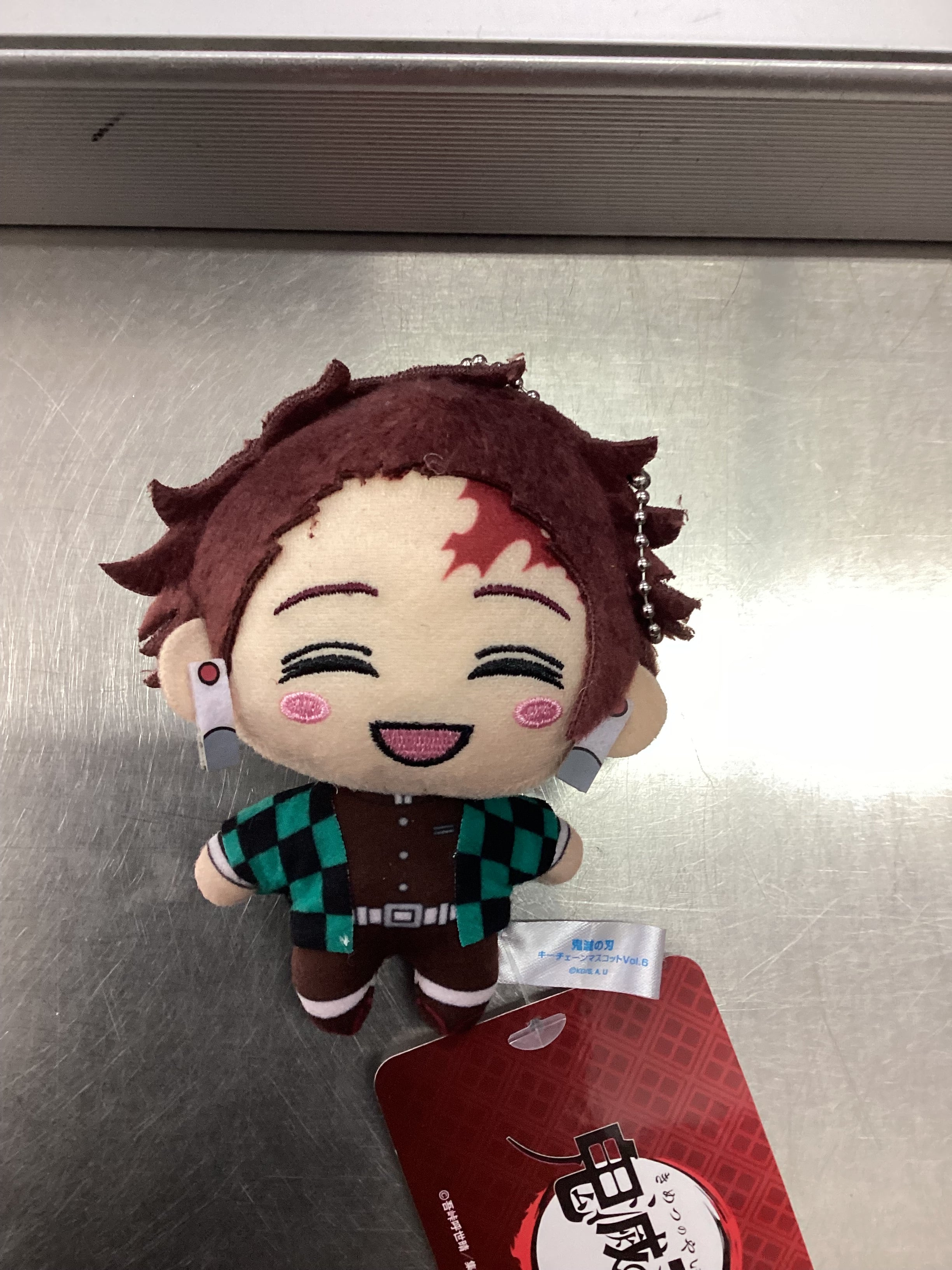 DEMON SLAYER TANJIRO KAMADO VOLUME 6 KEYCHAIN PLUSH